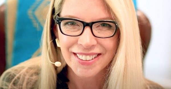 Hillary Evans wearing a headset